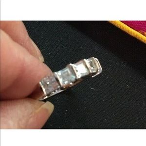 14k white gold with princess cut stones. sz 8